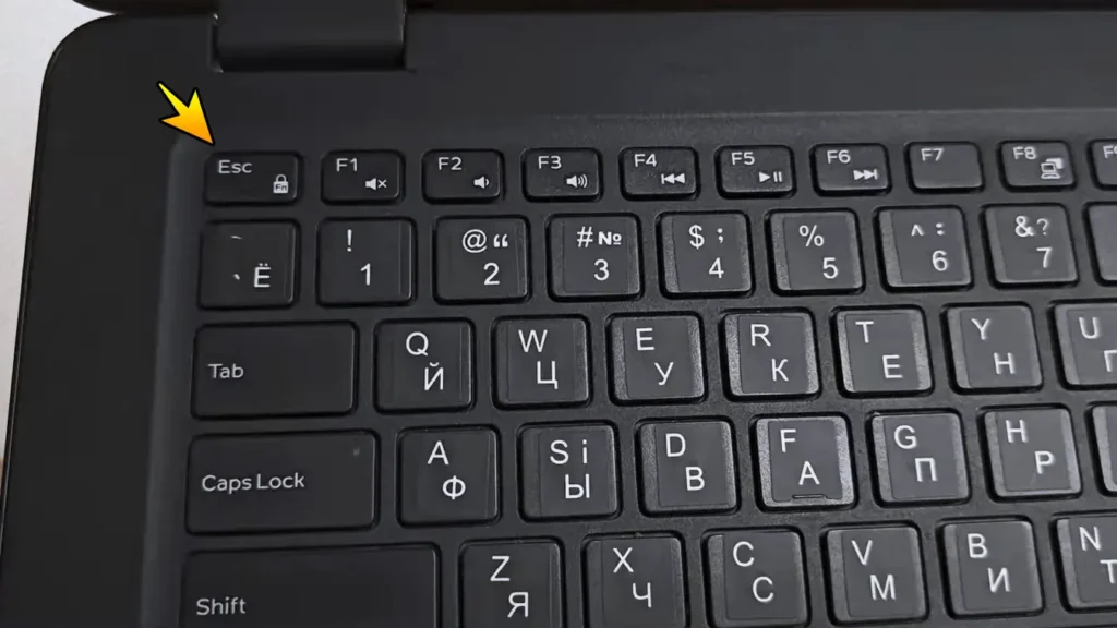Small FN Lock icon located on the Esc key