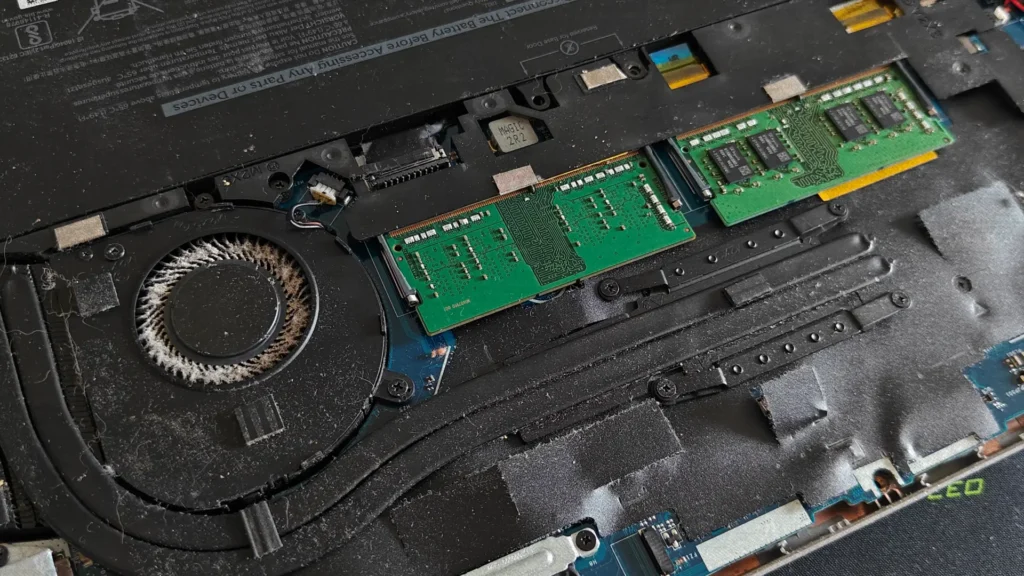 Dust accumulation on a laptop cooling fan