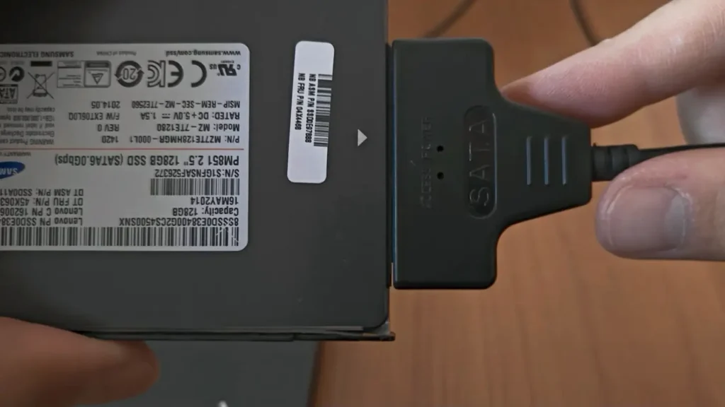 SATA to USB adapter connected to a Samsung SSD