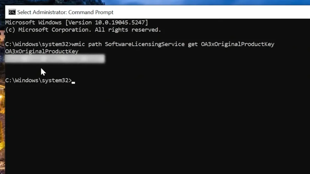 WMIC command in Command Prompt showing a Windows product key