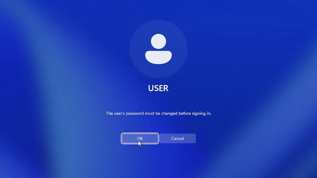 Windows sign-in screen showing the user’s password must be changed before signing in message