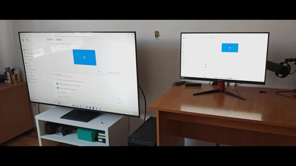 Dual display setup with Full HD monitor and 4K TV connected to RX 9070 XT