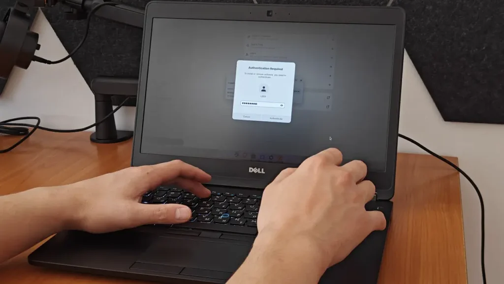 Entering a password in the Zorin OS authentication window on Dell Latitude