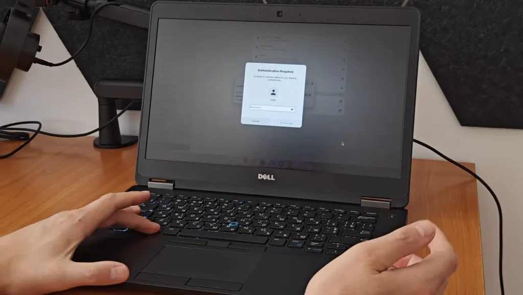 Zorin OS authentication password prompt on a Dell Latitude laptop